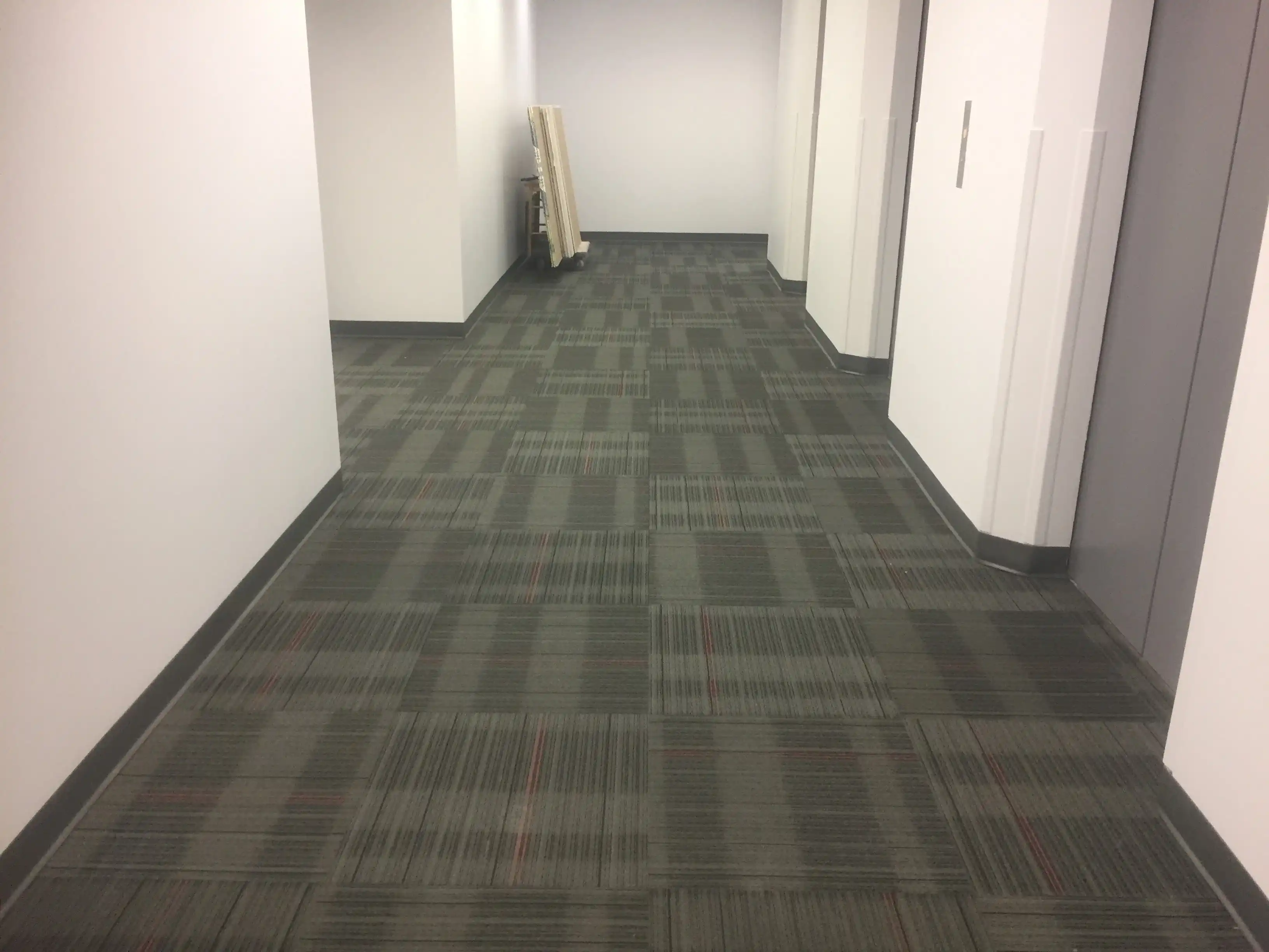 Post construction office corridor before final clean — Zusashi Maintenance post construction cleaning GTA